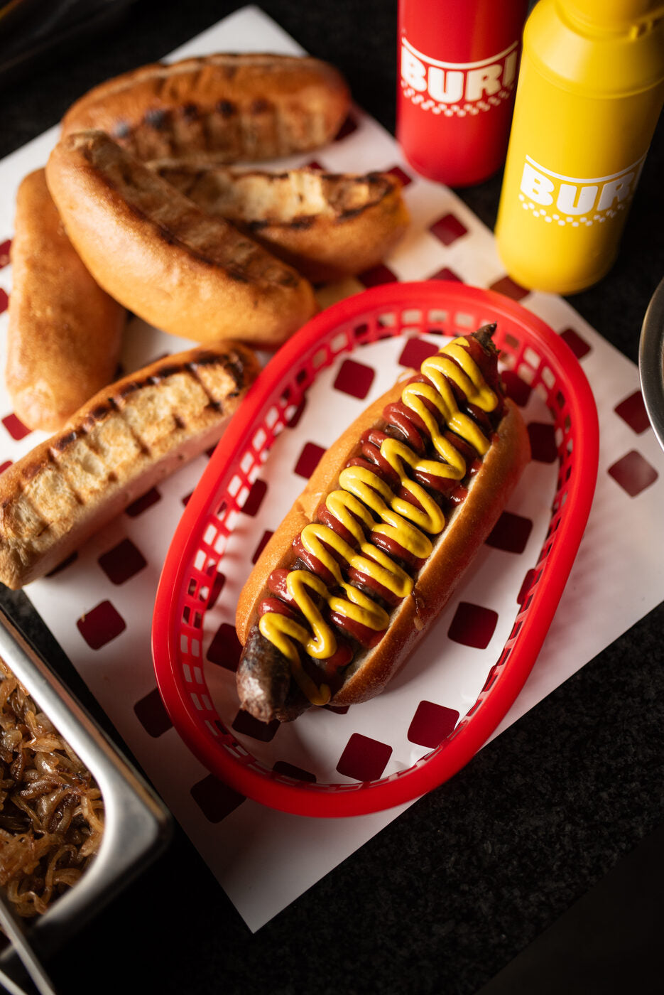 BURI classic boerewors roll with tomato sauce and mustard