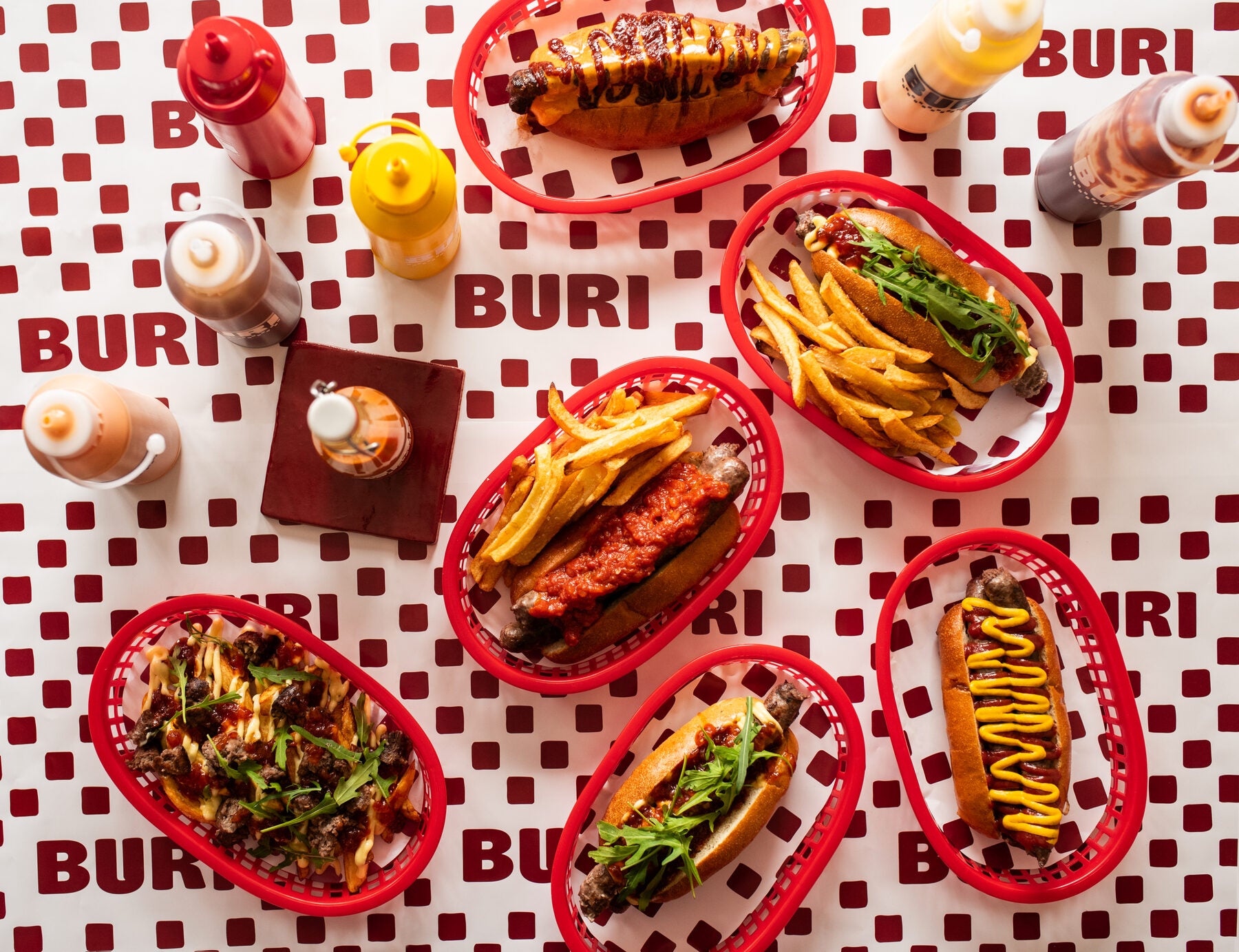 BURI sauce station with tomato sauce, mustard, chutney and homemade sauces